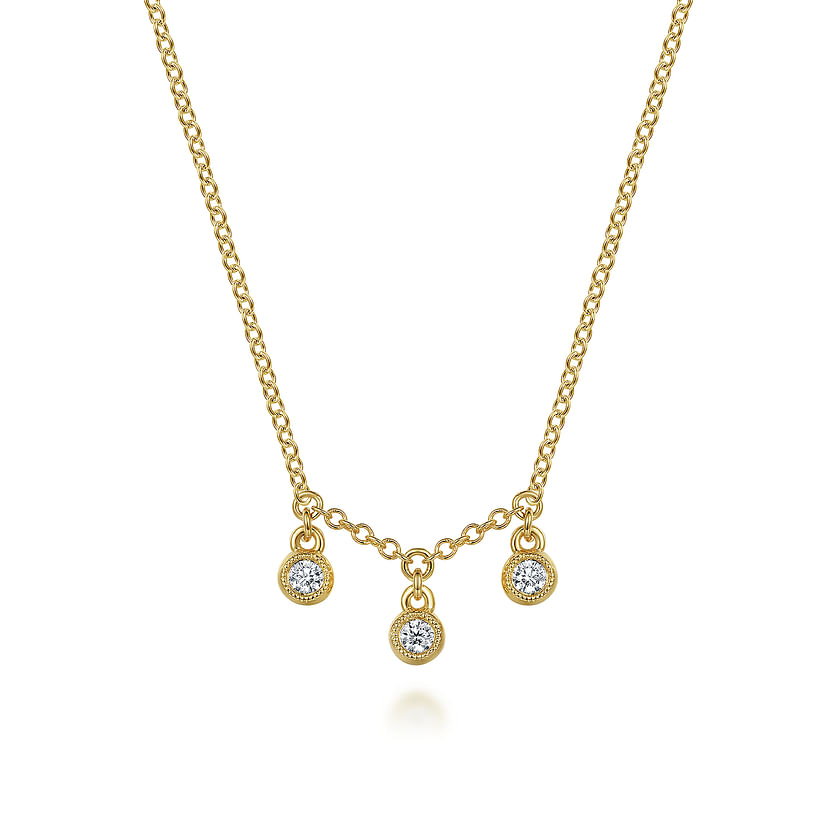 The 14K Yellow Gold Diamond Drop Pendant Necklace by Gabriel & Co features three round diamond pendants in delicate 14K yellow gold bezels for a refined, elegant look.