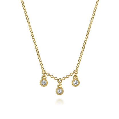 The 14K Yellow Gold Diamond Drop Pendant Necklace by Gabriel & Co features three round diamond pendants in delicate 14K yellow gold bezels for a refined, elegant look.