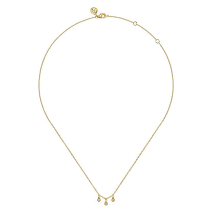 Elegant 14K yellow gold diamond drop pendant necklace by Gabriel & Co, featuring a fine adjustable chain and a sparkling centerpiece. Ideal for layering or wearing alone, this timeless piece adds sophistication to any look.