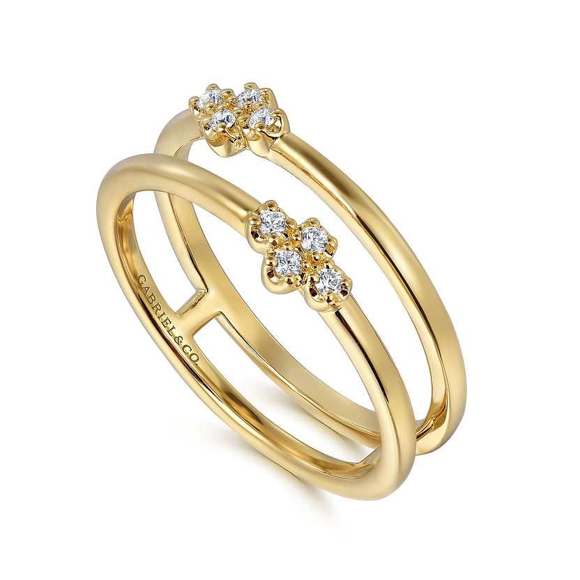 The Gabriel & Co 14K Yellow Gold Diamond Easy Stackable Ring features a double band with clusters of four natural diamonds atop, joined by a vertical gold bar and engraved "GABRIEL & CO" on the inner band.
