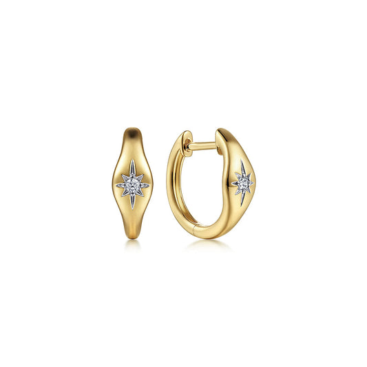 14K Yellow Gold Diamond Huggie Earrings by Gabriel & Co feature a starburst design with a central clear gemstone, polished finish, and secure hinged closure.