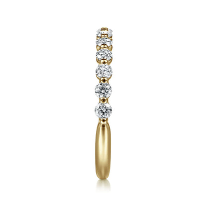 The Gabriel & Co 14K Yellow Gold Diamond Ladies Ring features seven natural diamonds set in a row along the upper band, shown from the front on a white background. Ideal for stacking and adding luxury to your look.