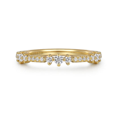 The 14K Yellow Gold Diamond Ladies Ring by Gabriel & Co features a row of small natural diamonds and a central star-like cluster. "GABRIEL & CO." is engraved inside the band. Ideal for stacking.