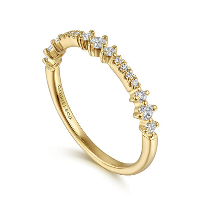Gabriel & Co's 14K Yellow Gold Diamond Ladies Ring features a row of natural diamonds on the top half of the band and the brand engraved inside.