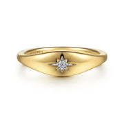 The 14K Yellow Gold Diamond Starburst Signet Ring by Gabriel & Co features a central diamond and a polished finish—a timeless piece of jewelry.