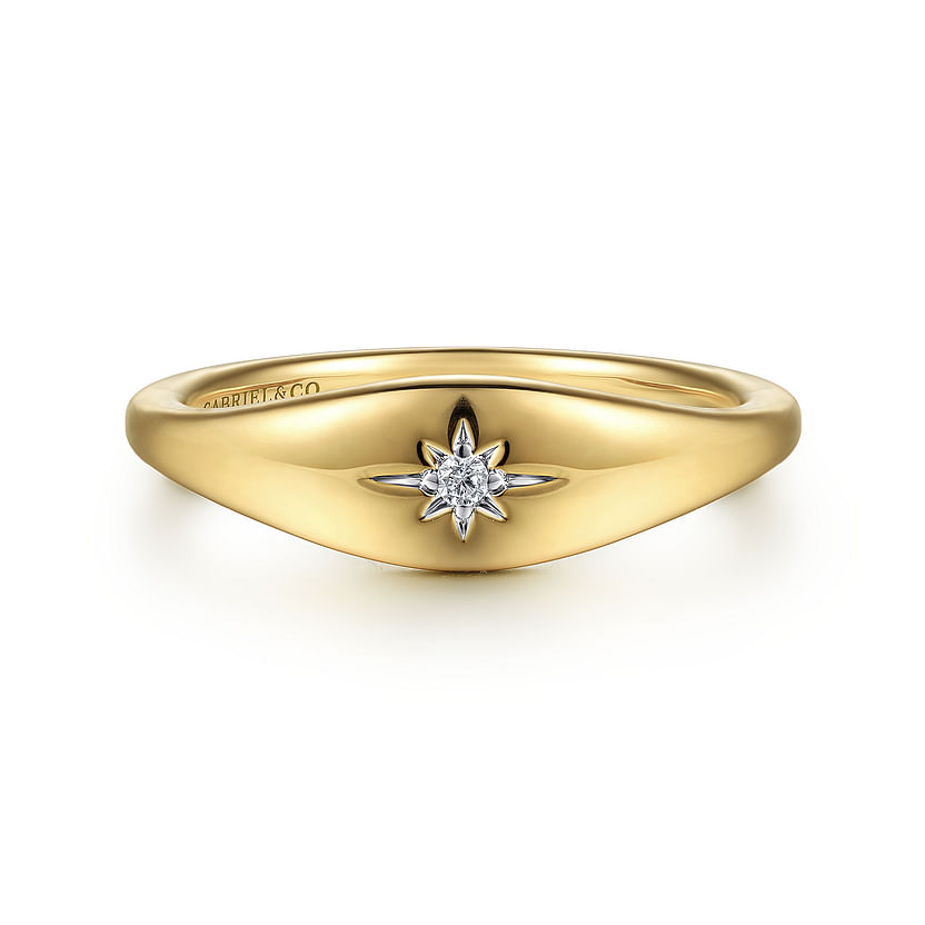 The 14K Yellow Gold Diamond Starburst Signet Ring by Gabriel & Co features a central diamond and a polished finish—a timeless piece of jewelry.