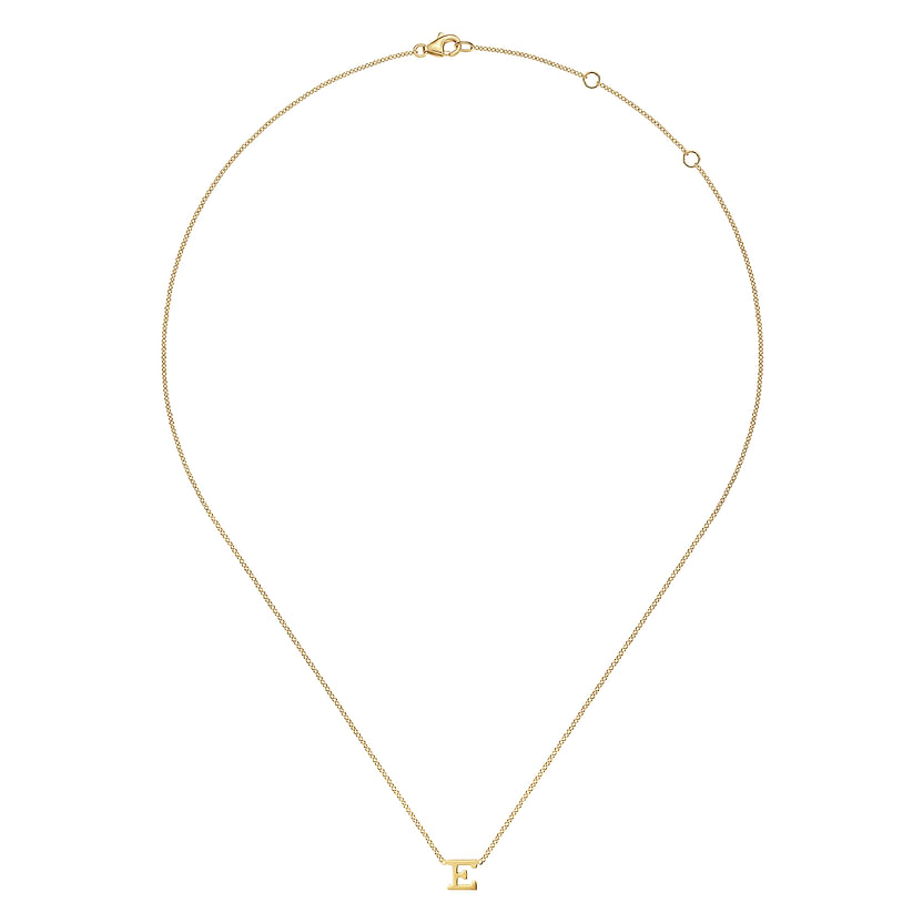 The Gabriel & Co 14K Yellow Gold E Initial Necklace features a delicate gold "E" pendant and adjustable clasp—an elegant piece for everyday wear.