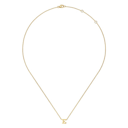 The Gabriel & Co 14K Yellow Gold E Initial Necklace features a delicate gold "E" pendant and adjustable clasp—an elegant piece for everyday wear.