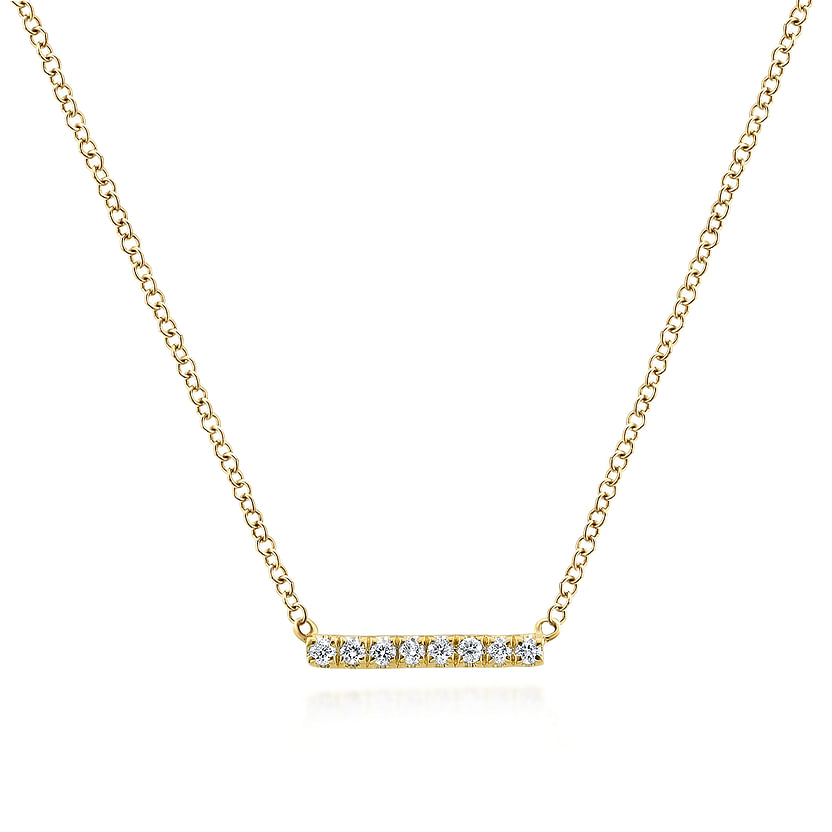 The Gabriel & Co 14K Yellow Gold Petite Pave Diamond Bar Necklace showcases a minimalist horizontal bar pendant set with seven sparkling diamonds, shown on a white background.