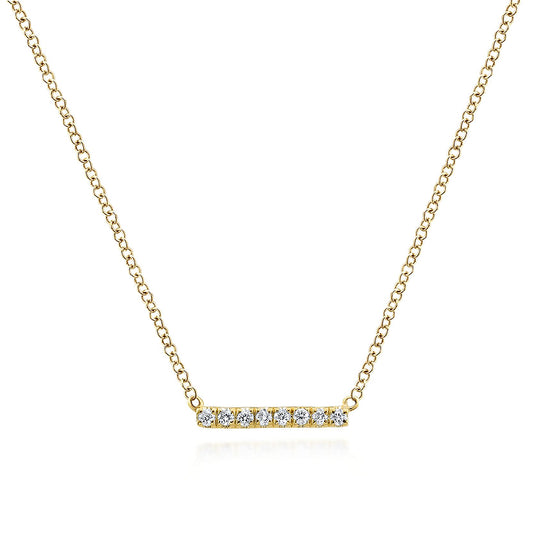 The Gabriel & Co 14K Yellow Gold Petite Pave Diamond Bar Necklace showcases a minimalist horizontal bar pendant set with seven sparkling diamonds, shown on a white background.