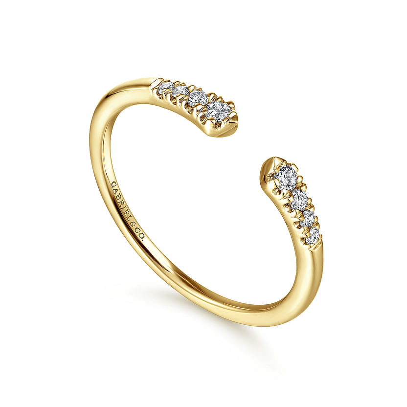 The 14K Yellow Gold Split Diamond Stackable Ring by Gabriel & Co features clusters of natural diamonds on each open tip and has "Gabriel & Co" engraved inside the band.