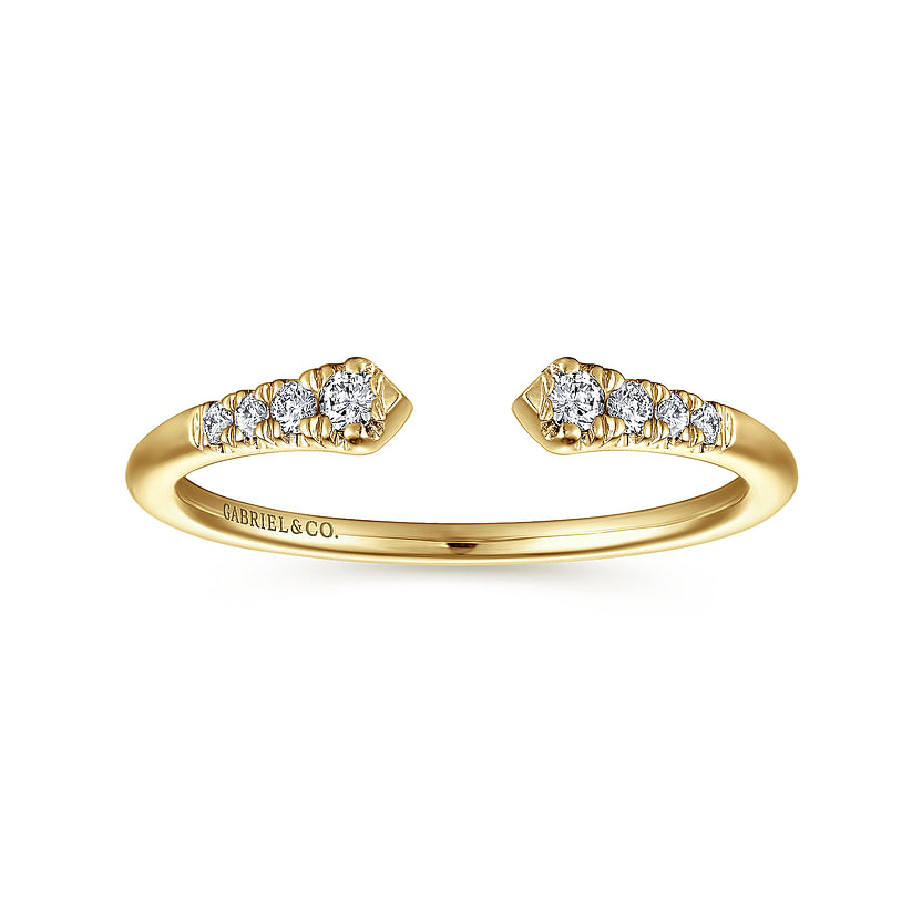 The 14K Yellow Gold Split Diamond Stackable Ring by Gabriel & Co features two rows of natural diamonds on each tip and is engraved inside. This elegant piece enhances any jewelry collection.