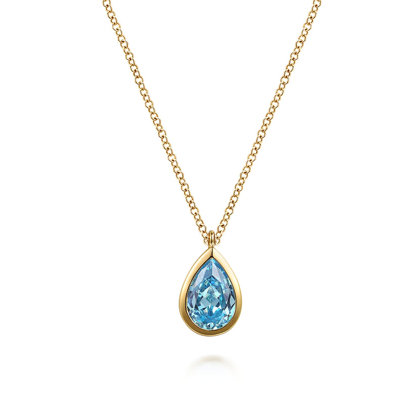 The Gabriel & Co 14K Yellow Gold Teardrop Blue Topaz Pendant Necklace is an elegant December birthstone gift, featuring a stunning blue topaz in a gold setting, beautifully showcased on a white background.