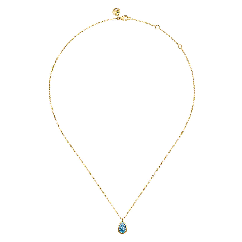 The Gabriel & Co 14K Yellow Gold Teardrop Blue Topaz Pendant Necklace makes a stunning December birthstone gift, with its elegant blue topaz set in gold and beautifully displayed against a white background.
