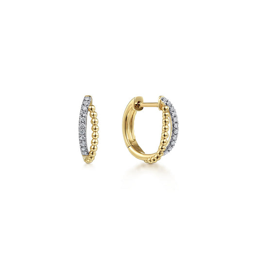 Gabriel & Co 14K Yellow Gold Twisted Pave 10mm Diamond Huggie Earrings feature a textured bead design on one side and sparkling diamonds on the other, shown from front and side. These chic earrings bring effortless elegance to any look.