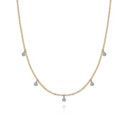 The Gabriel & Co 14K Yellow-White Gold Diamond Stations Droplet Necklace from the Contemporary Collection features five small round diamond pendants spaced along a delicate chain, shown on a white background.