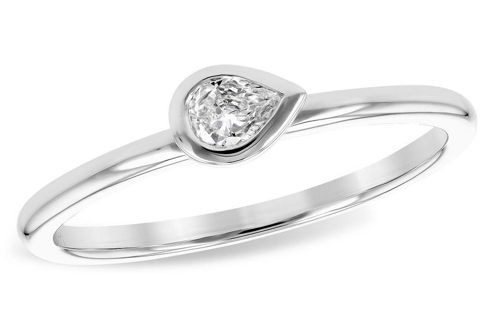 Allison Kaufman presents a timeless treasure with their 14K Solitaire Ring featuring a pear-shaped diamond in a delicate bezel setting. The sleek, minimal band accentuates the elegant diamond centerpiece, showcased beautifully against a white background.