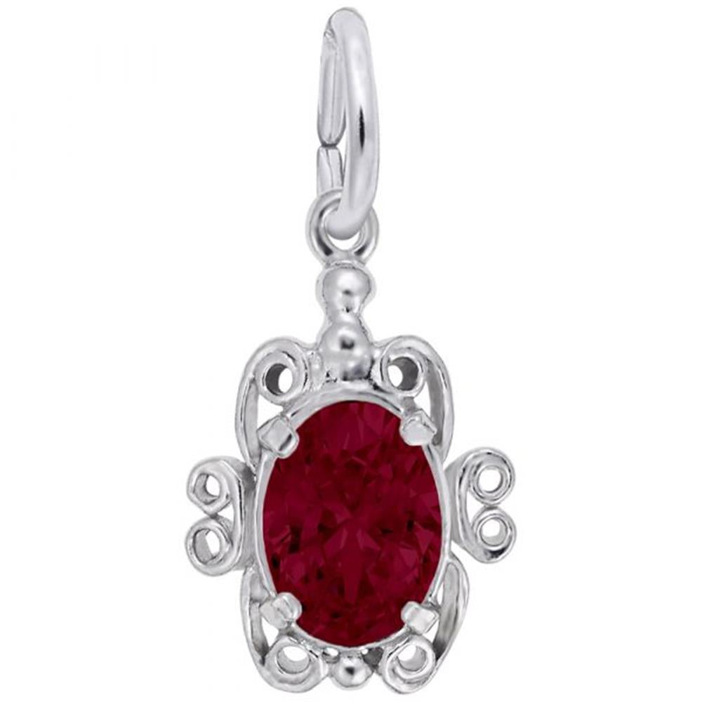 The January Birthstone Charm in Sterling Silver by Rembrandt Charms is a silver pendant shaped like a stylized turtle, featuring an oval-shaped red January birthstone at its center. The sterling silver charm boasts intricate, decorative filigree details and includes a loop on top for easy attachment to a chain.