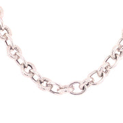 Close-up of the Sterling Silver Textured Rolo Chain by Royal Chain Group-Royal Chain, showcasing interlocked oval links. The textured pattern on the surface of each link gives the chain its distinctive, intricate appearance. The white background accentuates the design of this Royal Chain product.