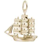 The Rembrandt Charms Sailboat Charm is a gold-plated sterling silver pendant shaped like a traditional sailing ship with three sails and detailed rigging. It features a small, round loop at the top for attaching to a chain.