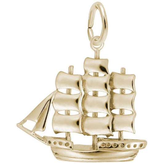 The Rembrandt Charms Sailboat Charm is a gold-plated sterling silver pendant shaped like a traditional sailing ship with three sails and detailed rigging. It features a small, round loop at the top for attaching to a chain.