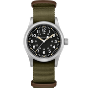 The Hamilton KHAKI FIELD MECH GN NATO H50 MOVEM wristwatch features a silver case and a dark green nylon strap. Its black dial is adorned with white Arabic numerals for hours (1-12) as well as a smaller inner ring for 13-24. The watch includes white hour, minute, and second hands with luminous accents for enhanced visibility. This model, UGLFVS7QF, is equipped with the H50 MOVEM movement for precision timing.