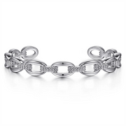 Introducing the 925 Sterling Silver Oval Link Cuff from Gabriel & Co.'s Bujukan Collection. This elegant bracelet features an exquisite chain-link design with alternating smooth and textured links, creating a refined and sophisticated appearance. The unique open-ended design allows for easy wear and adjustment, making it a perfect addition to your jewelry collection.