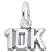 A silver pendant in the shape of the numbers and letter "10K," reminiscent of a 10K Race Charm / Sterling Silver by Rembrandt Charms. Crafted from sterling silver, the "0" is an open ring with a small loop on top, perfect for hanging from a chain or bracelet. The pendant boasts a polished, shiny finish.