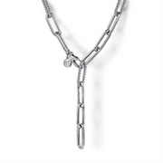Here’s a close-up image of the Gabriel & Co 925 Sterling Silver Y Chain Necklace (Serial No: S1746137), featuring large, elongated oval links. This 20-inch necklace boasts a 'Y' design with a smaller chain intersecting through one of the middle links. A small round charm with an embossed design hangs near the intersection, evoking the elegance characteristic of the Bujukan Collection.