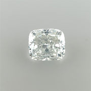 A Cedar Trading, Inc Cushion 0.90ct EGL Certified Natural Diamond with a clear, brilliant sparkle, shown against a plain, light grey background. The E Color diamond's facets are well-defined, capturing light and displaying a range of bright reflections. This SI1 clarity gem is perfect for those who appreciate timeless elegance.