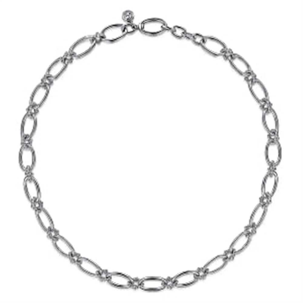 The Gabriel & Co 925 Sterling Silver Oval Link Chain Necklace with Bujukan Connectors features a simple yet elegant design. The necklace includes interlocking oval links and a lobster claw clasp at the top for secure fastening, with Bujukan connectors adding a slight twist detail to each link.