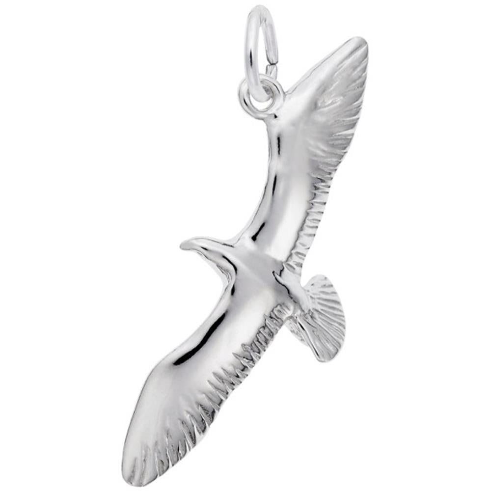 The Seagull Charm by Rembrandt Charms is a sterling silver pendant shaped like a soaring seagull with outstretched wings, detailed feathers, and a loop at the top for attaching to a necklace or bracelet. This charming piece adds an elegant touch to any collection.