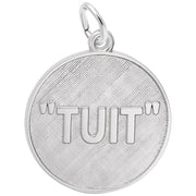 The Tuit Disc Charm - Sterling Silver Charm by Rembrandt Charms is a round pendant with a textured surface, engraved with the word "TUIT" in capital letters. It features a small loop at the top for easy attachment to a chain or keyring.