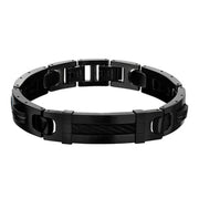 A sleek Men's Stainless Steel Black IP with ID Plate Link Bracelet from INOX features a segmented design and a clasp, with an intricately detailed central section. This 8.75" bracelet combines shiny, polished metal and matte elements for a modern, sophisticated look.