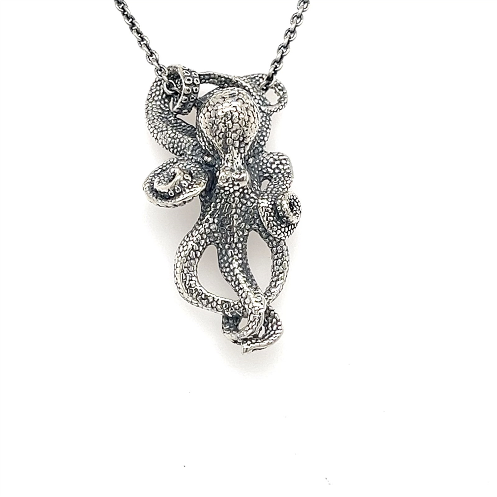The Kabana SS Octopus Pendant with oxidized silver features curled tentacles on an 18in chain, displayed against a white background.