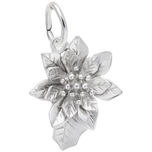 The Rembrandt Charms Poinsettia Charm is crafted from sterling silver and features a poinsettia flower design with detailed petals and small, raised dots at the center mimicking seeds. The shiny charm has a polished finish and is attached to a round loop at the top for easy hanging or wearing on a necklace.