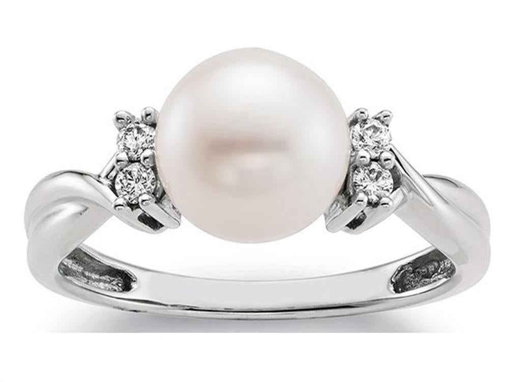 The Mastoloni 14K White Gold Pearl Ring features an 8-8.5MM round white freshwater pearl, complemented by four small diamonds and a unique twisted band design. This elegant piece showcases exquisite craftsmanship and timeless elegance, perfect for any occasion.