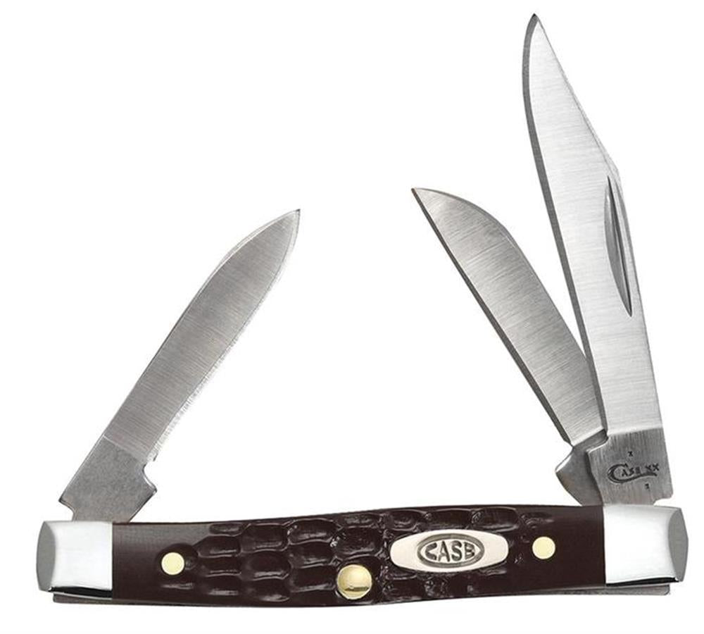 The Brown Synthetic Standard Jig Knife | Case 00081 by W.R. Case & Sons Cutlery Co. is displayed with its three blades open. The knife boasts a polished, textured brown synthetic handle adorned with a metal emblem featuring the brand name "Case." The blades come in various sizes and shapes akin to a Small Stockman, with the largest being a clip point blade.