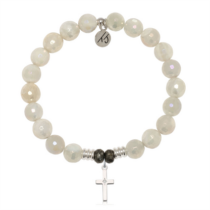 The T Jazelle Moonstone Gemstone Bracelet features round, faceted moonstones accented by two dark beads and silver spacers, with a sterling silver CZ cross charm and a "15" engraved tag near the clasp.