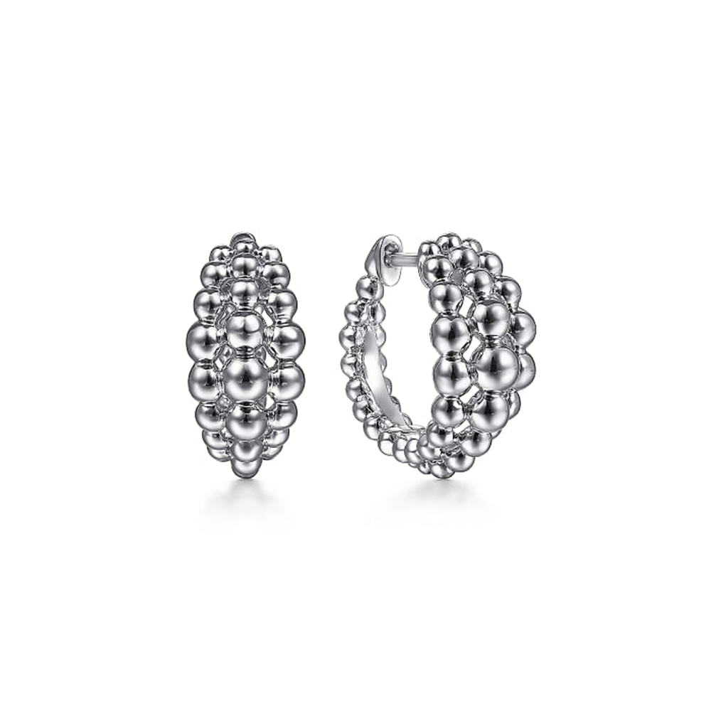 Introducing the Gabriel & Co 925 Sterling Silver Bujukan Huggie Earrings from the Bujukan Collection. These earrings are meticulously designed with multiple layers of small, interconnected spherical beads, creating a textured and intricate pattern. They feature a polished, shiny finish and an open-backed design with a post and clasp closure.