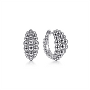Introducing the Gabriel & Co 925 Sterling Silver Bujukan Huggie Earrings from the Bujukan Collection. These earrings are meticulously designed with multiple layers of small, interconnected spherical beads, creating a textured and intricate pattern. They feature a polished, shiny finish and an open-backed design with a post and clasp closure.