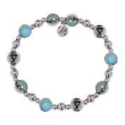 The Day by Day Collection—Blue Silver Agate Gemstone Bracelet by T Jazelle features alternating silver and teal-blue beads with a round silver charm, perfect as a gemstone or charm bracelet.