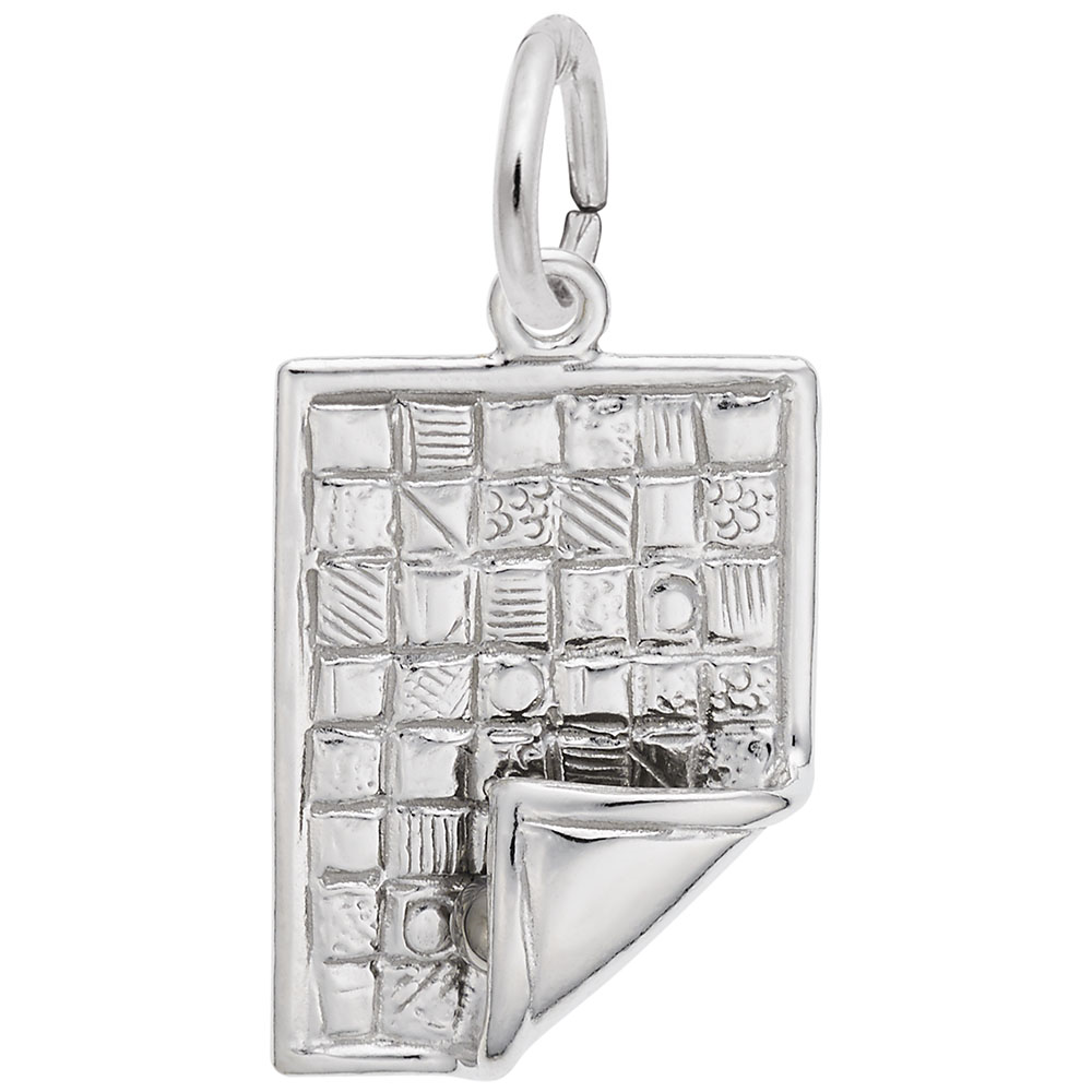 The Rembrandt Charms quilt-themed sterling silver charm features a textured book design with a quilt grid pattern. One corner curves up like a turning page, and the charm includes a small loop for attaching to bracelets or necklaces.