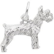 The Rembrandt Charms Schnauzer Dog Charm is a sterling silver charm shaped like a standing Schnauzer with textured fur detailing. It features a small loop at the top for easy attachment to a bracelet or necklace.