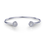The Open Cuff Halo Bracelet by Lafonn showcases a minimalist design with a sleek, silver band and two round diamond-encrusted ends. This bracelet exudes modern elegance and luxury with its polished finish and refined appearance.