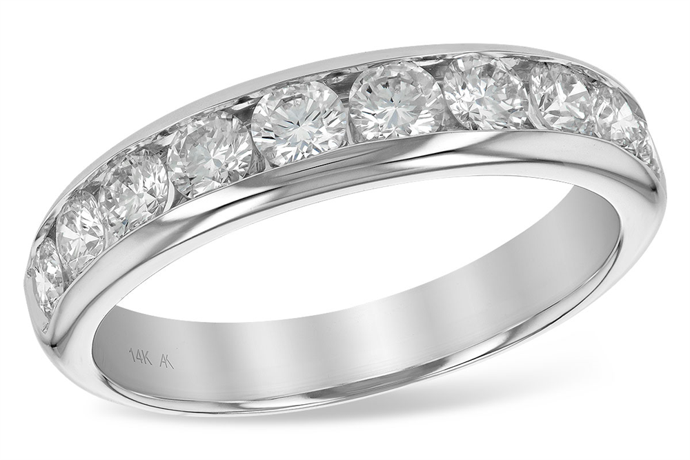 A close-up view of the Allison Kaufman Ladies Wedding Ring | 1 carats, adorned with six round-cut H/VS2 diamonds set in a channel setting. The ring has a polished finish and is marked with "14K" on the inner band, indicating its gold purity. The 1.00 carat diamonds are evenly spaced, giving the ring an elegant look—an ultimate symbol of love.