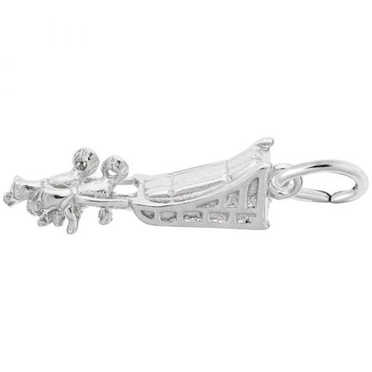 A detailed sterling silver charm by Rembrandt Charms is designed to resemble a dog sled. The charm has ornate features and is attached to a small loop, likely for attaching to a bracelet or necklace.