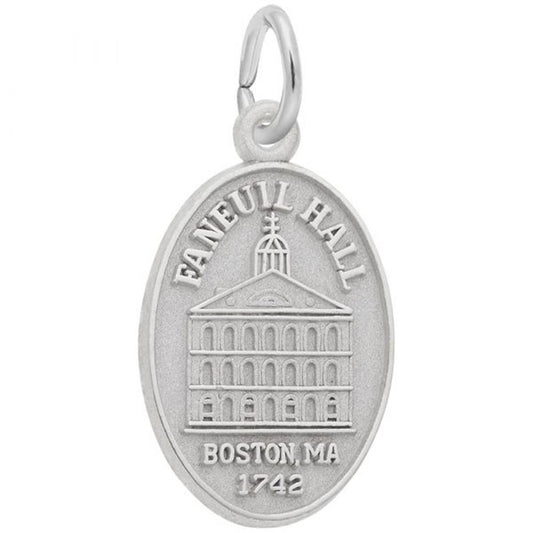 The Faneuil Hall Oval Disc - Sterling Silver Charm by Rembrandt Charms is an exquisitely crafted piece featuring an engraved depiction of Faneuil Hall with its distinctive facade. The text "FANEUIL HALL" is elegantly arched above the building, and "BOSTON, MA 1742" is precisely inscribed below. A small metal loop at the top allows for easy attachment to a chain or bracelet.