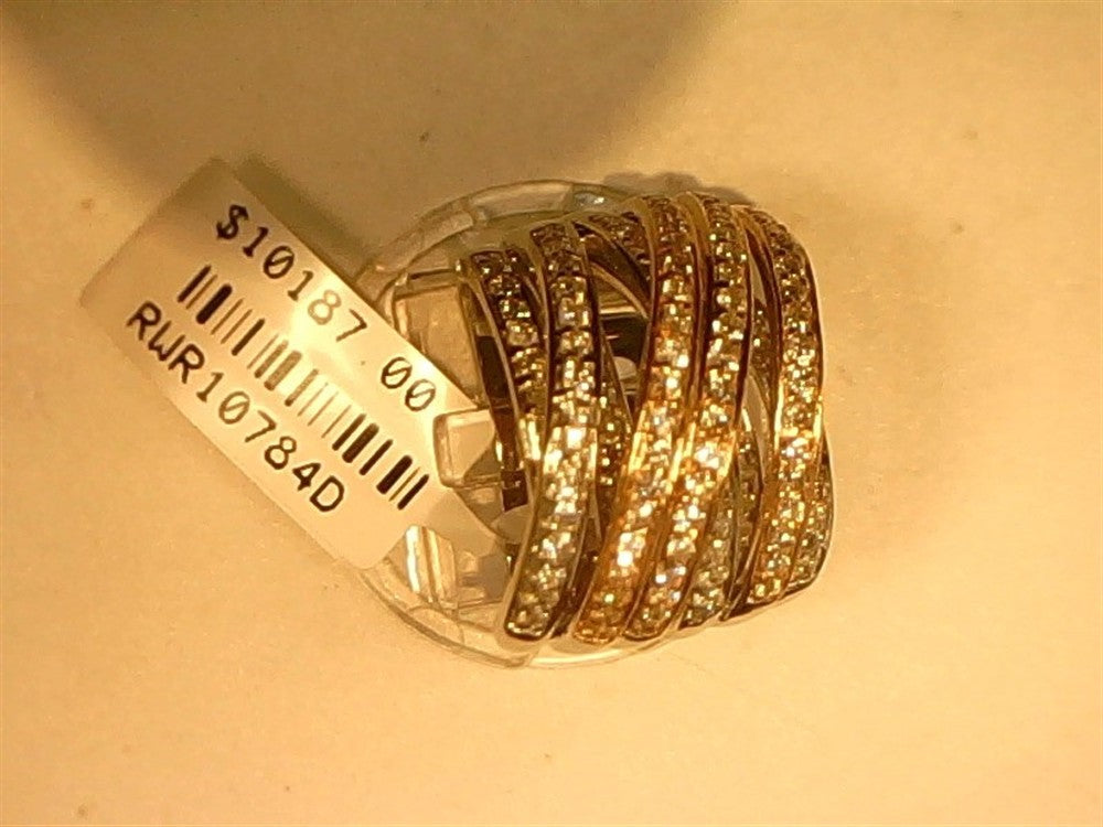 A stunning Ryan Gems large two-tone multi-band ring in 14k white and rose gold, size 7, is displayed on a white stand with a "$10187.00" price tag and code "RWR10784D" attached.