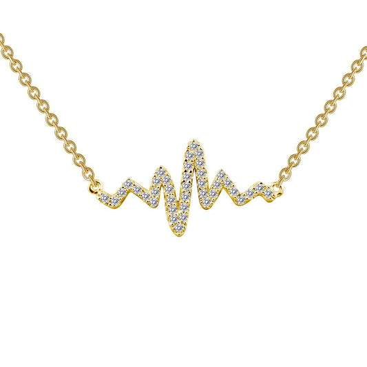 The Heartbeat Necklace by Lafonn is crafted in yellow gold, featuring a chain of links and a pendant shaped like an electrocardiogram line. The pendant is adorned with small, sparkling white gemstones, adding an elegant touch to the design.